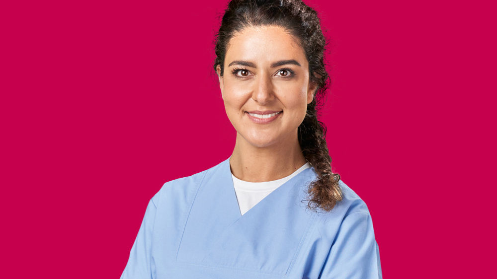 A portrait of female healthcare professional smiling