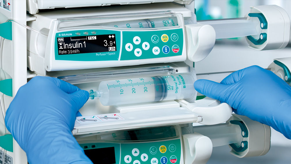 Space® plus pumps and a mobile phone