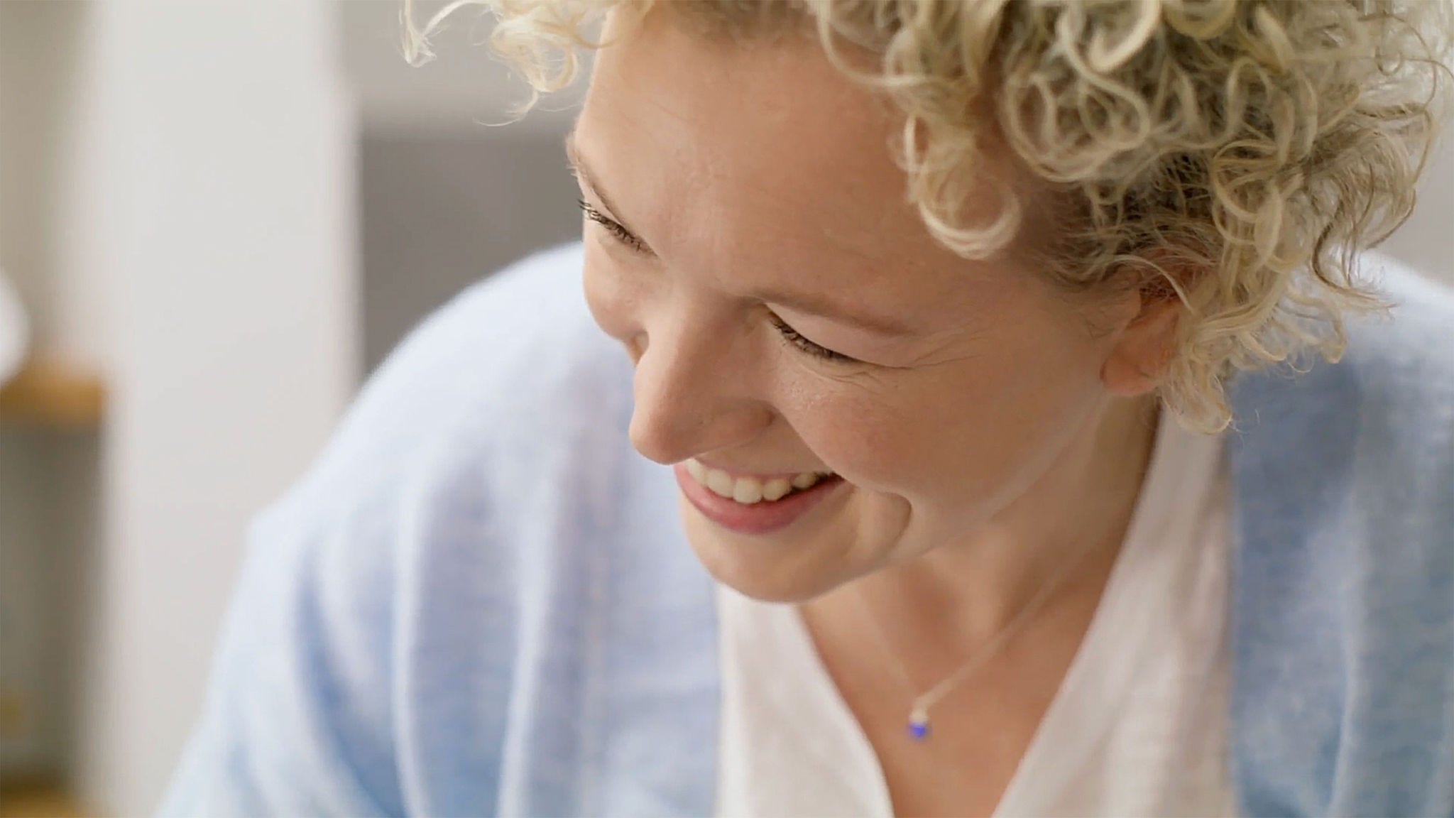 A healthcare professional with a warm smile.