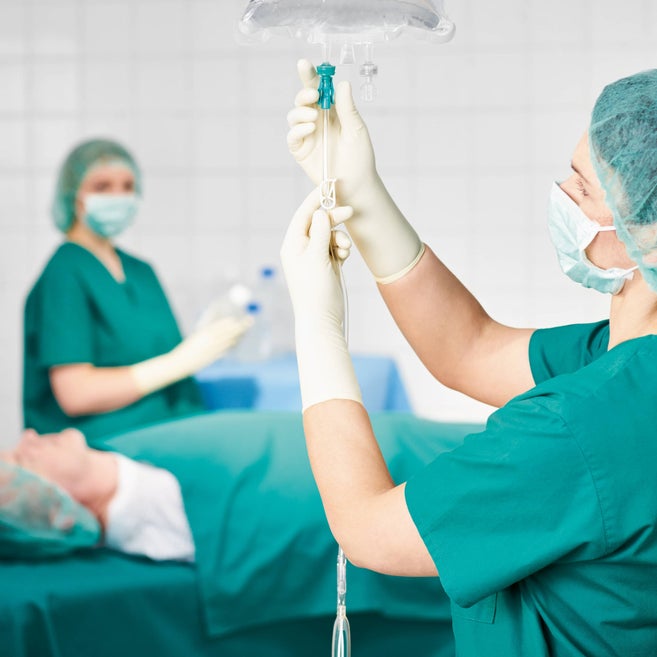 Nurse administering perioperative medication