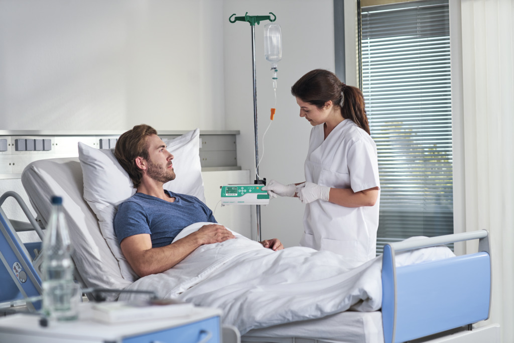 Man and woman sitting in front of a monitor