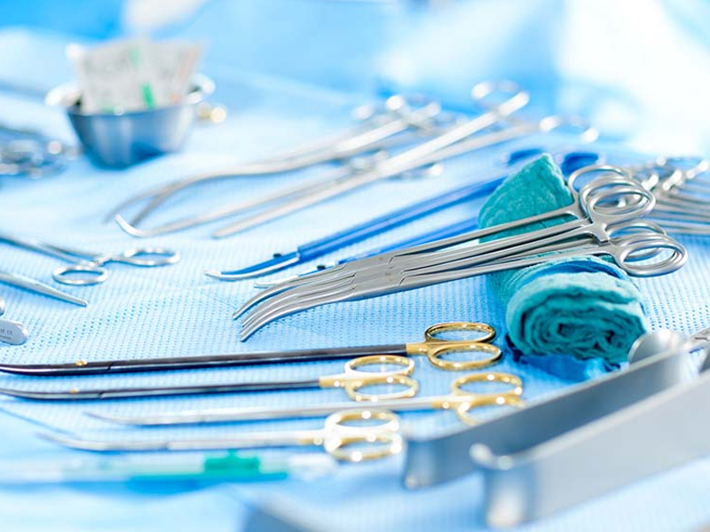 Surgical instruments laid out on a table, ready for use